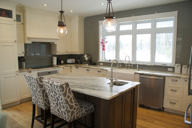 Example of a transitional kitchen design in Toronto