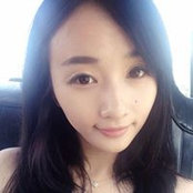 YI WANGs billede