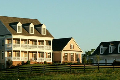 Inspiration for a large timeless three-story concrete fiberboard exterior home remodel in DC Metro