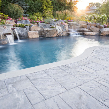 freeform oaisis with a waterfeature and waterfalls in Short Hills NJ