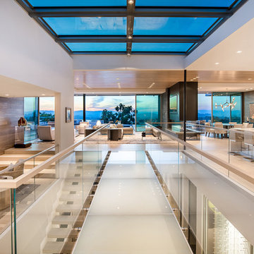 Trousdale Beverly Hills luxury home modern glass bridge walkway with skylight ov
