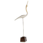 Cyan Design - Shorebird Sculpture #1 - Play up a mantel with this sophisticated nickel bird sculpture. Metallic color blocking creates neutral decor with a refined twist. The metal figure features thin and elongated lines, adding contrast and effortless class.