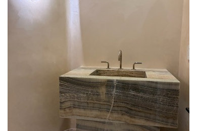 Inspiration for a mediterranean powder room remodel in Los Angeles