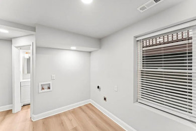 Example of a laundry room design in Other