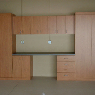 Garage cabinets, desk and lots of storage