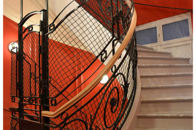 This is an example of a vintage staircase in Paris.