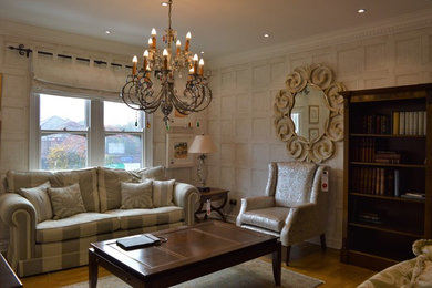 Design ideas for a contemporary living room in Other with grey walls and light hardwood flooring.