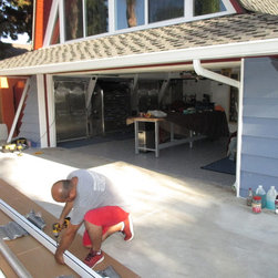 Motorized Power Screen Installed on Garage Door - Products