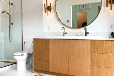Inspiration for a midcentury master bathroom in Seattle with flat-panel cabinets, light wood cabinets, white walls, white floor, white benchtops, a double vanity and a built-in vanity.