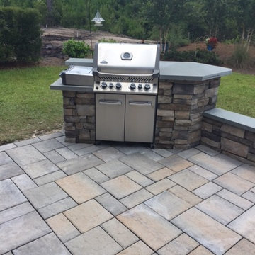 Grill with veneer stone