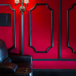This is an example of a medium sized classic enclosed home cinema in Other with red walls, carpet, a projector screen and red floors.