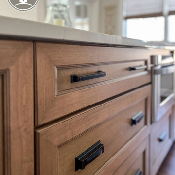 Bright & Timeless Kitchen Reorientation with Fireplace Refresh