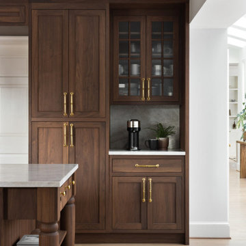 Luxury Transitional Kitchen with Walnut Cabinetry, Marble Slab Backsplash & Bras