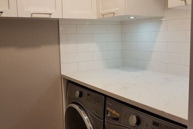 Photo of a modern utility room in Vancouver.