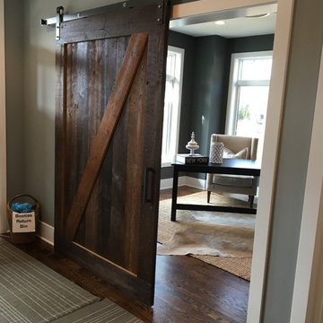 Antique Sliding Reclaimed Wood Barn Door in Transitional Home Office