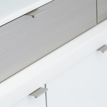 Stainless Steel Drawers and Acrylic White Cabinetry from Dura Supreme