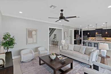 Example of a transitional living room design in Orlando