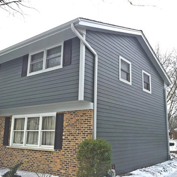 Dark James Hardie Siding & Trim, Soffit, Fascia & Gutters in Naperville