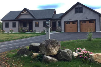 Large mountain style gray one-story wood exterior home photo in Portland Maine with a shingle roof