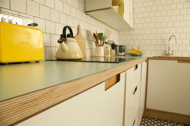 Design ideas for a contemporary kitchen in Sussex.