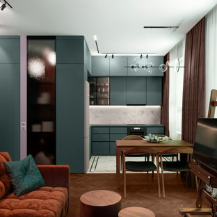 Photo of a mid-sized l-shaped eat-in kitchen in Moscow with flat-panel cabinets, turquoise cabinets, laminate benchtops, white splashback, porcelain splashback, porcelain floors, white floor, turquoise benchtop, an undermount sink, black appliances and no island.
