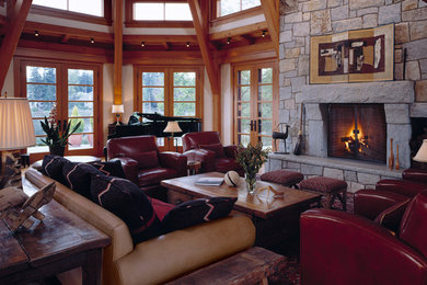 Photo of a large traditional open concept living room in Seattle with white walls, carpet, a two-sided fireplace, a stone fireplace surround and no tv.