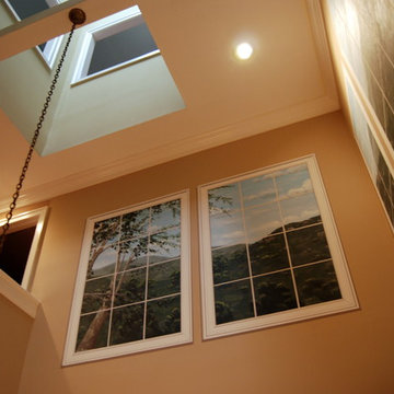 Trompe L'Oeil Windows in two story Dining Room.