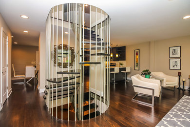 Inspiration for a mid-sized 1960s wooden spiral open staircase remodel in Chicago
