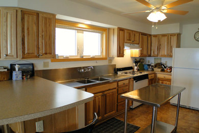 Inspiration for a small beach style eat-in kitchen in Other with an integrated sink, light wood cabinets, laminate benchtops, white appliances and with island.