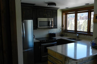 Example of a mountain style kitchen design in Other