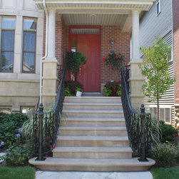 Solid stone stairs with ornamental iron railing - Products