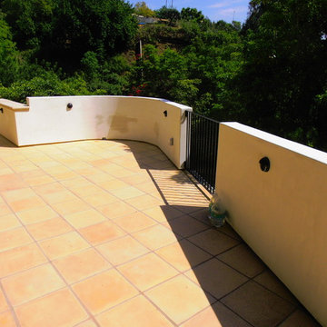 Hillside Room Addition with balcony and steps