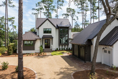 Beach style home design photo in Other