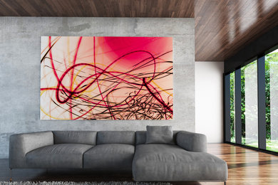 Inspiration for a large industrial loft-style medium tone wood floor living room remodel in Chicago with gray walls