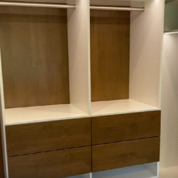 Modern Master Closet with Lighting and Drawers