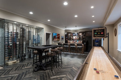 Inspiration for a large transitional look-out basement in Kansas City with beige walls, medium hardwood floors, no fireplace and multi-coloured floor.