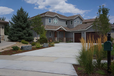 Design ideas for a mid-sized traditional full sun front yard concrete paver formal garden in Denver.