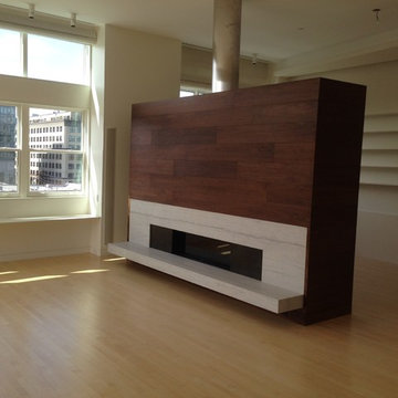 Walnut entertainment center and fireplace surround