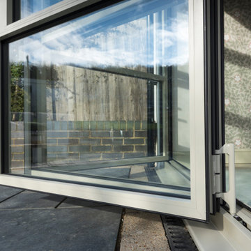 Our Brand New OB-36⁺ Soho Bifold paired with our OI-30 Internal Door