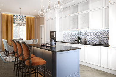 Photo of a large eclectic single-wall eat-in kitchen with an undermount sink, recessed-panel cabinets, white cabinets, quartz benchtops, blue splashback, mosaic tile splashback, stainless steel appliances, porcelain floors, with island, brown floor and black benchtop.
