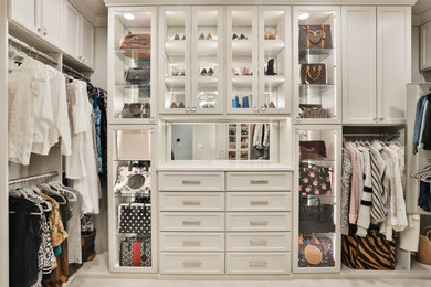Inspiration for a contemporary closet remodel in St Louis
