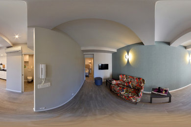 Réalisation d'une salle de séjour minimaliste de taille moyenne et ouverte avec un téléviseur fixé au mur.