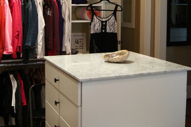 Inspiration for a transitional closet remodel in Houston