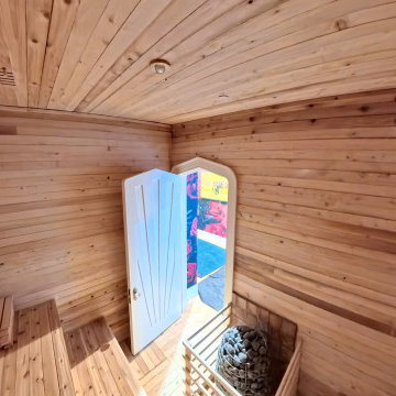 Custom Luxury Home Sauna with Natural Wood Interior