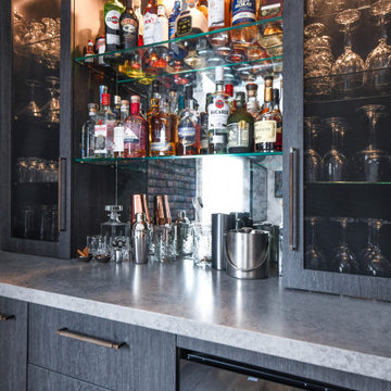 Bespoke bar area with mesh doors and custom handles