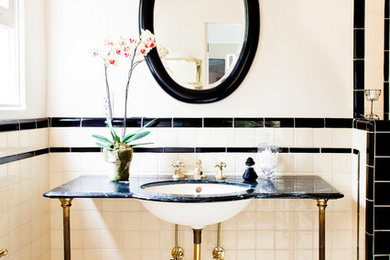 Inspiration for a timeless white tile bathroom remodel in Los Angeles with an undermount sink and white walls