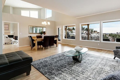 Inspiration for a large enclosed light wood floor and beige floor living room remodel in Boise with no fireplace and no tv