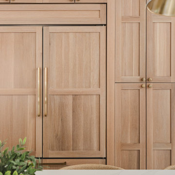 Scandinavian Kitchen with Light Oak Cabinets and Quartzite Island