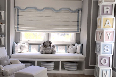 Example of a mid-sized transitional master dark wood floor bedroom design in Miami with gray walls and no fireplace