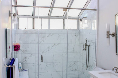 Trendy bathroom photo in Los Angeles with beaded inset cabinets and white cabinets